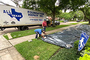 image of workers protecting owners property before beginning to work.