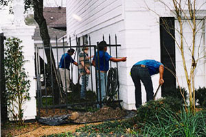 image of workers repairing a slab foundation